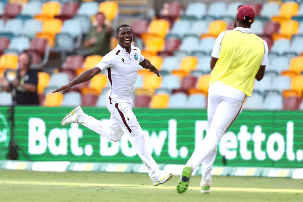 Shamar Joseph of the West Indies dismisses Josh Hazlewood of Australia, sealing a win for the West Indies on January 28, 2024. (Photo by Pat Hoelscher / AFP) 