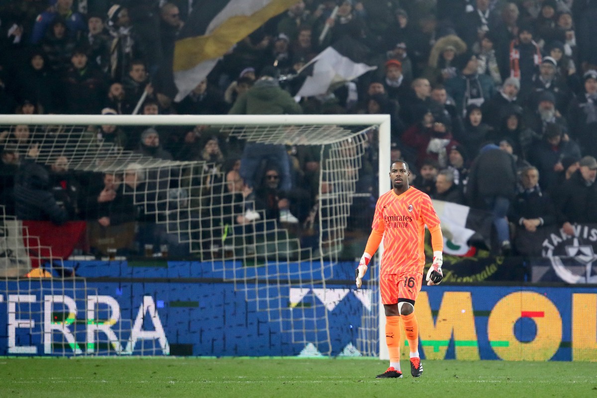 Milan’s goalkeeper Mike Maignan reacts during the Italian Serie A football match Udinese Calcio vs AC Milan at the Friuli - Dacia Arena stadium in Udine, on January 20, 2024. Photo by Gabriele MENIS / ANSA / AFP

