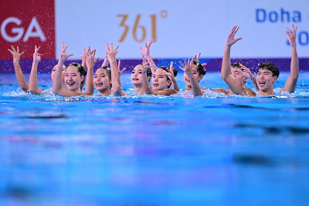 Team Thailand compete during the acrobatic routine artistic swimming preliminary round. AFP