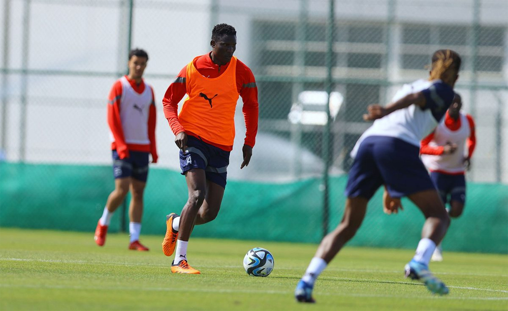 Al Duhail's Michael Olunga (second left) in action during a training session.