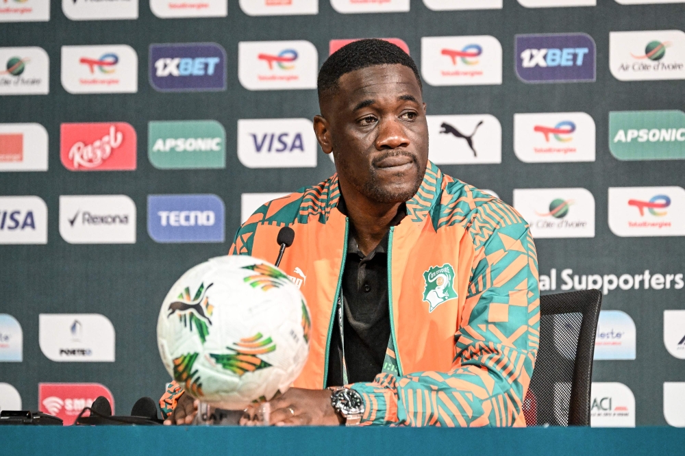 Ivory Coast's coach Emerse Fae looks on during a press conference at the Palais de la Culture in Abidjan on February 6, 2024, on the eve of the 2024 Africa Cup of Nations (CAN) semi-final football match between Ivory Coast and DR Congo. (Photo by Sia KAMBOU / AFP)
