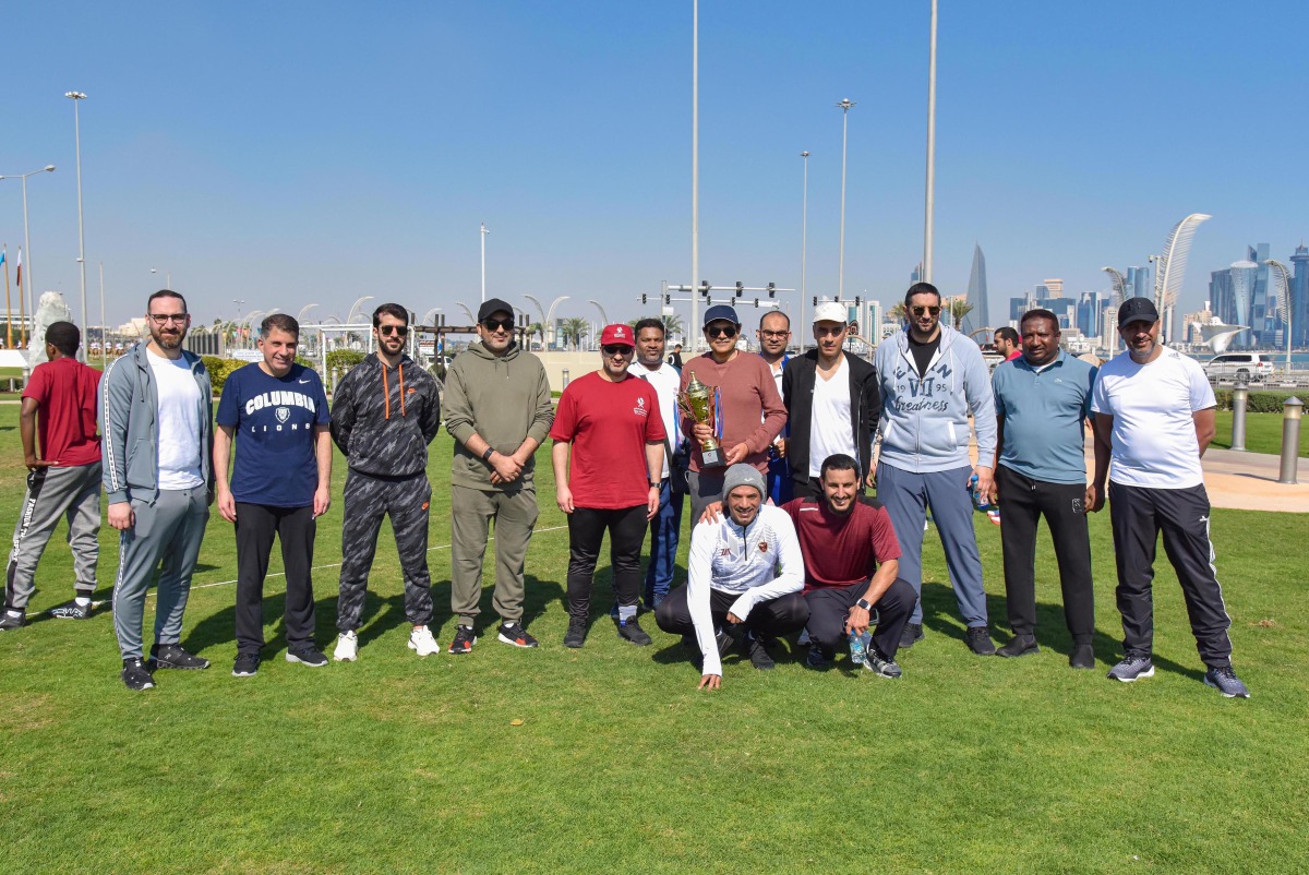 QCB Governor H E Sheikh Bandar bin Mohammed bin Saud Al Thani, QIIB CEO Dr Abdulbasit Ahmad Al Shaibei with employees at the celebration of National Sport Day.