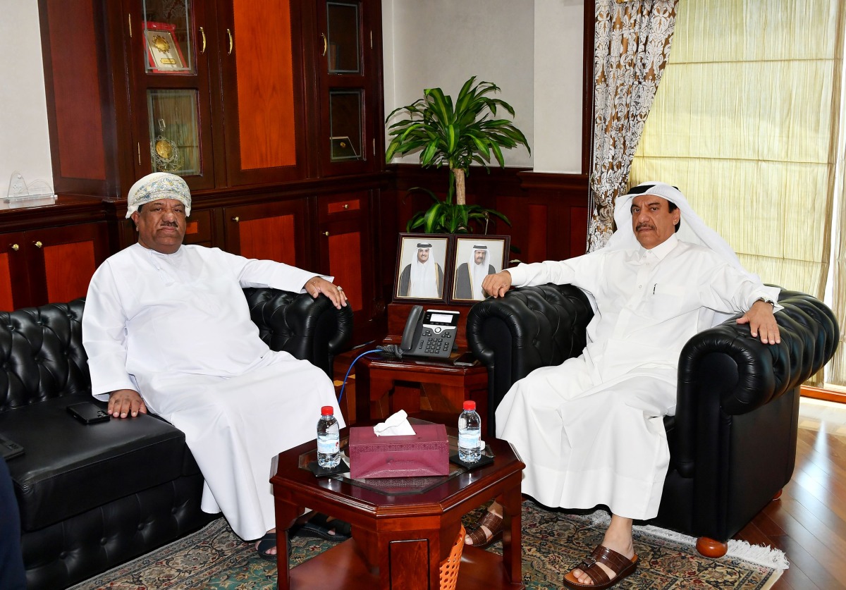 QC Acting General Manager Ali Saeed bu Sherbak Al Mansori with the board member of the Oman Chamber of Commerce and Industry, Reda bin Jomaa Al Saleh.
