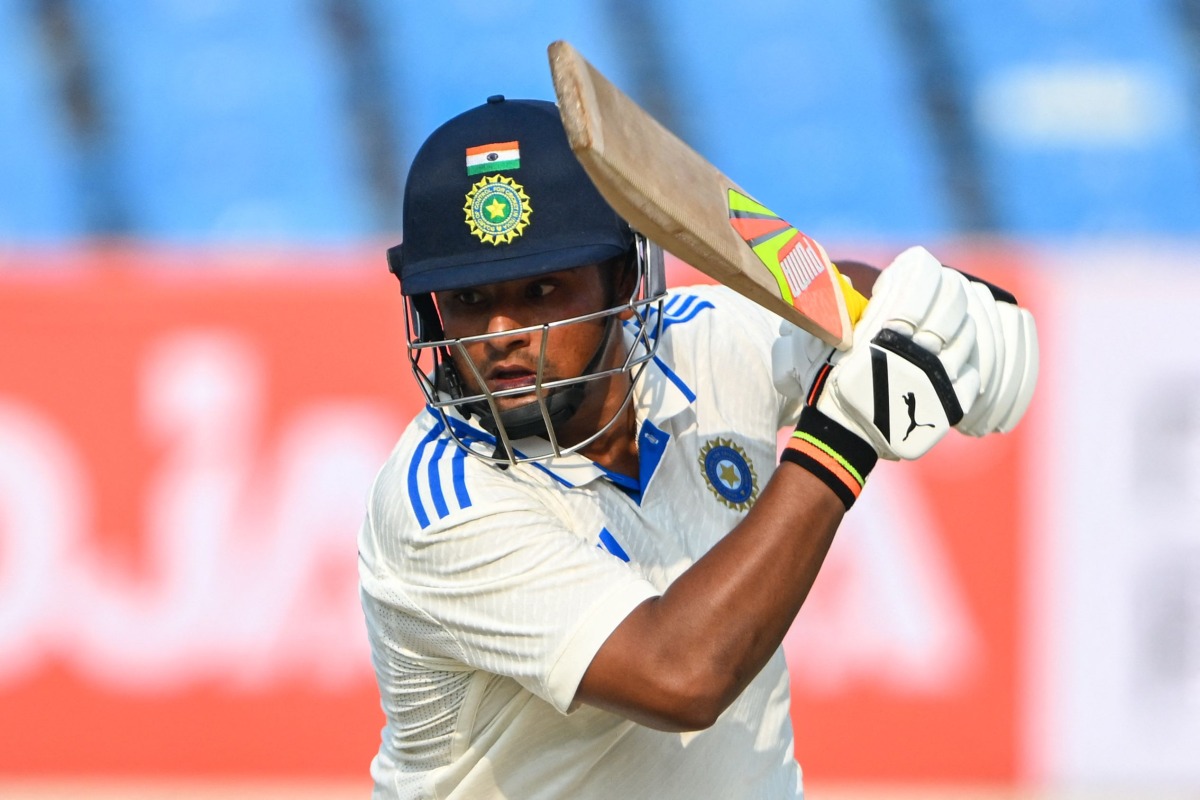 India's Sarfaraz Khan plays a shot during the first day of the third Test cricket match between India and England at Niranjan Shah stadium in Rajkot on February 15, 2024. (Photo by Punit PARANJPE / AFP) 
