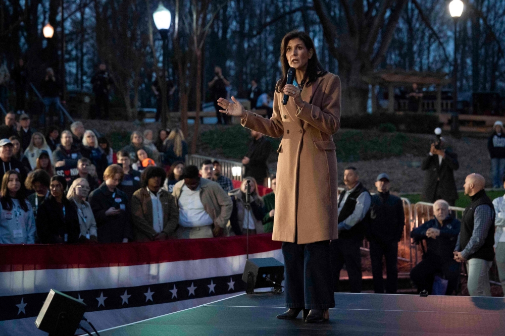 US Republican presidential hopeful and former UN ambassador Nikki Haley speaks during a campaign event at Irmo Town Park in Irmo, South Carolina, on February 17, 2024. (Photo by Allison Joyce / AFP)
