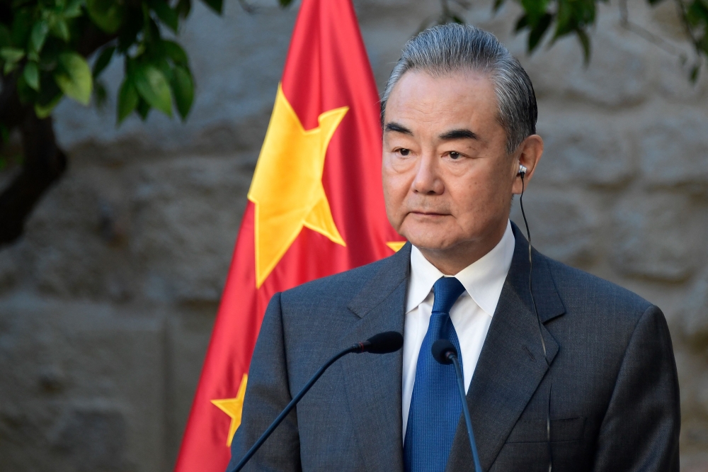 China's Foreign Minister Wang Yi. (Photo by Cristina Quicler / AFP)