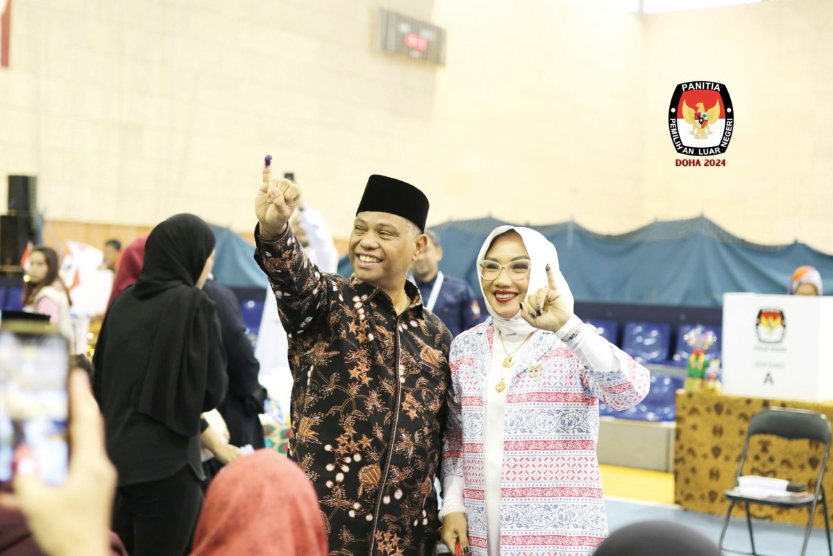 Ambassador of Indonesia to Qatar, H E Ridwan Hassan and wife after they cast their votes.