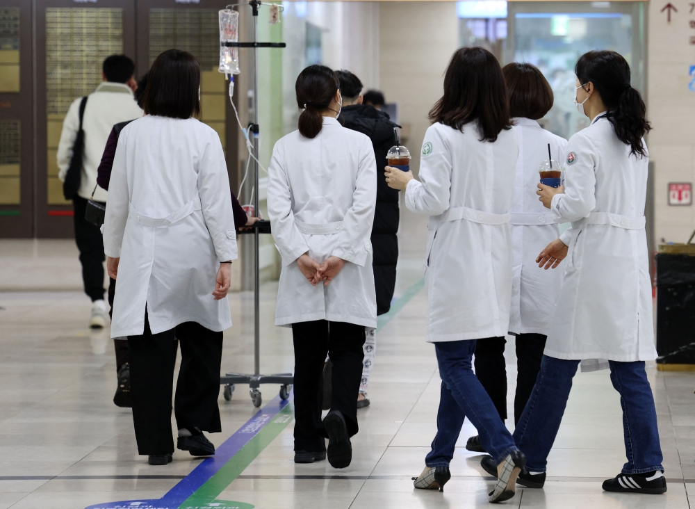 Medical staff are seen at a university hospital in Gwangju on February 19, 2024. Photo by YONHAP / AFP