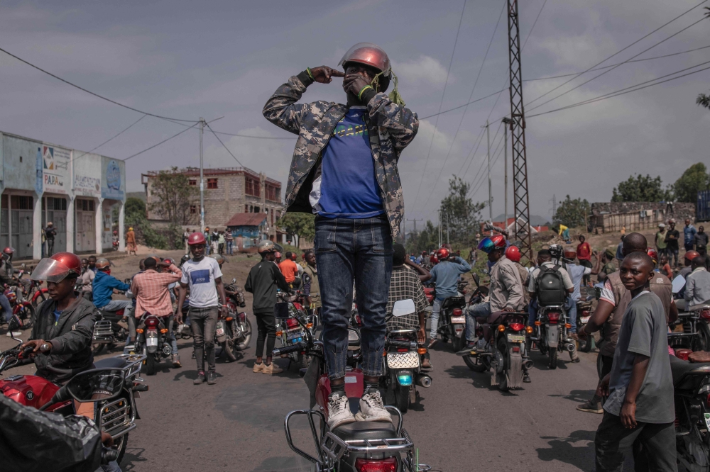 Demonstrators gather to denounce the international community's silence in the face of the perpetual crisis in the East of the Democratic Republic of Congo, and to show their support for the Congolese army and the pro-government militia Wazalendo, in Goma, on February 19, 2024. (Photo by Guerchom Ndebo / AFP)
