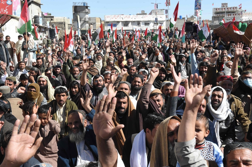 Supporters of a party alliance consisting of the Pashtoonkhwa Milli Awami Party, the Balochistan National Party, the National Party and the Hazara Democractic Party chant slogans during protest held outside an Election Commission office in Pishin on February 22, 2024, amid claims of alleged vote-rigging in Pakistan's national elections. (Photo by Banaras Khan / AFP)