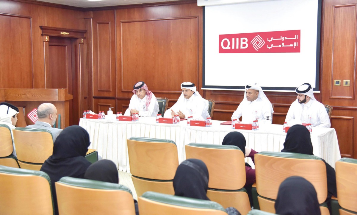 QIIB CEO Dr. Abdulbasit Ahmad Al Shaibei along with other officials during the event.