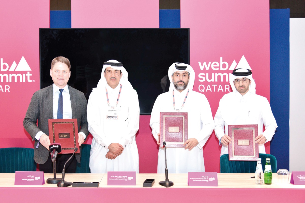 Minister of State and Chairman of QFZ and DVC H E Dr. Ahmad Al Sayed with other officials during the signing ceremony.