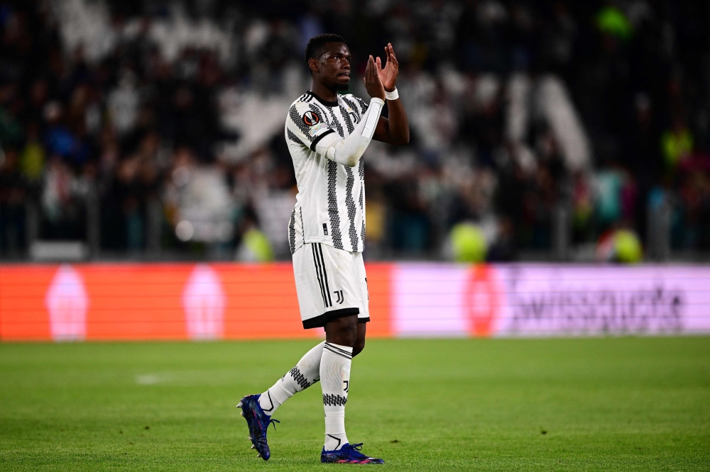 A picture taken on May 11, 2023 in Turin shows Juventus' French midfielder Paul Pogba acknowledging the public at the end of the UEFA Europa League semi-final first leg football match between Juventus and Sevilla. (Photo by Marco Bertorello / AFP)

