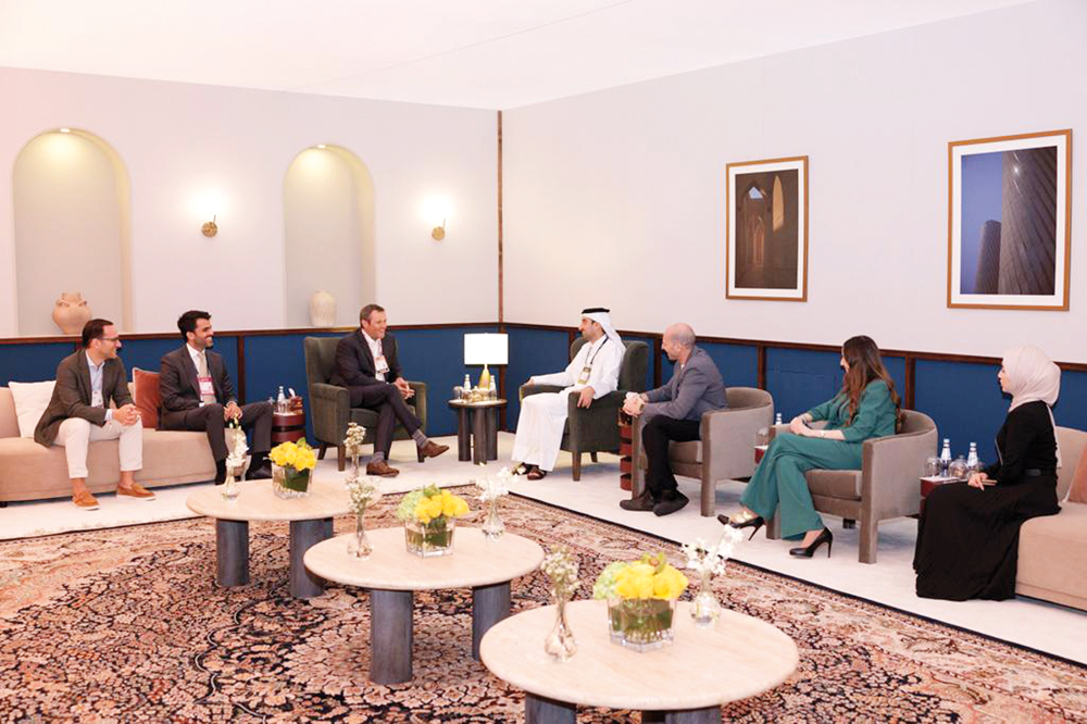 GCO Director and Chairman of the Web Summit Qatar 2024 Organising Committee, H E Sheikh Jassim bin Mansour bin Jabor Al Thani meeting a Web Summit delegate. 