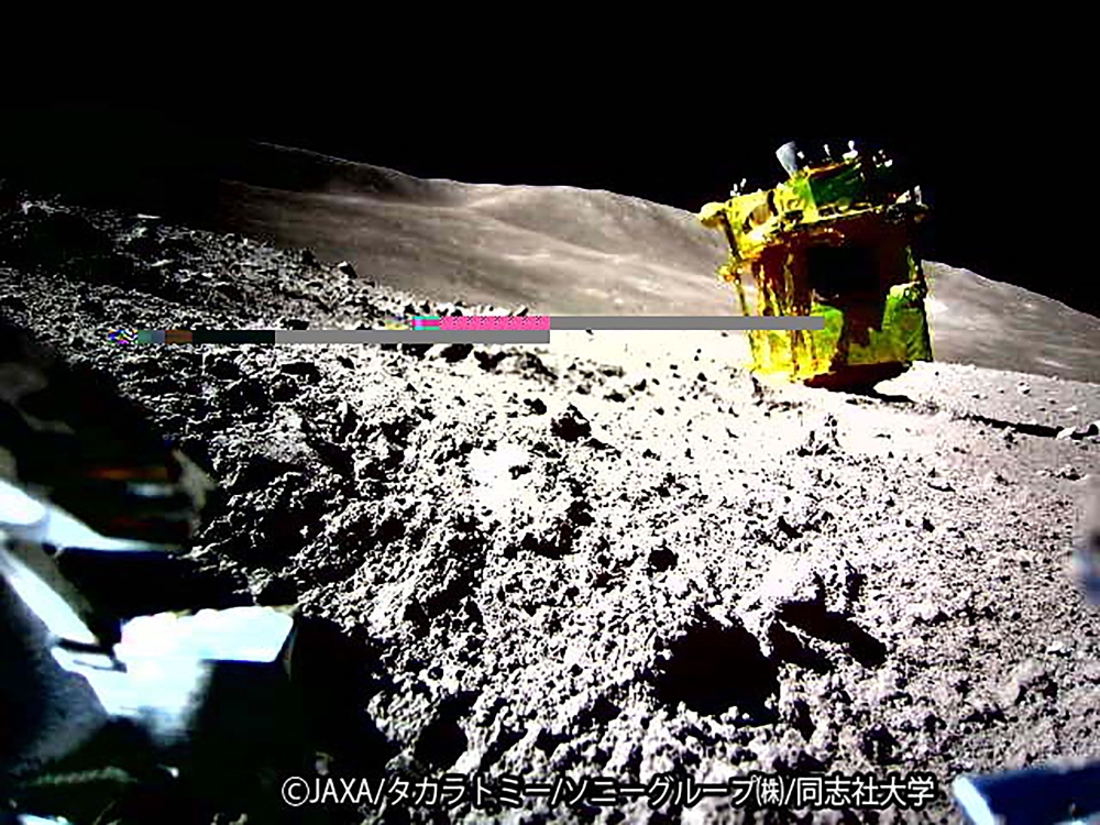 This handout photo released on January 25, 2024 from the Japan Aerospace Exploration Agency (JAXA) and credited to JAXA, Takara Tomy, Sony Group Corporation and Doshisha University shows an image of the lunar surface on January 20. Photo by Handout / various sources / AFP
