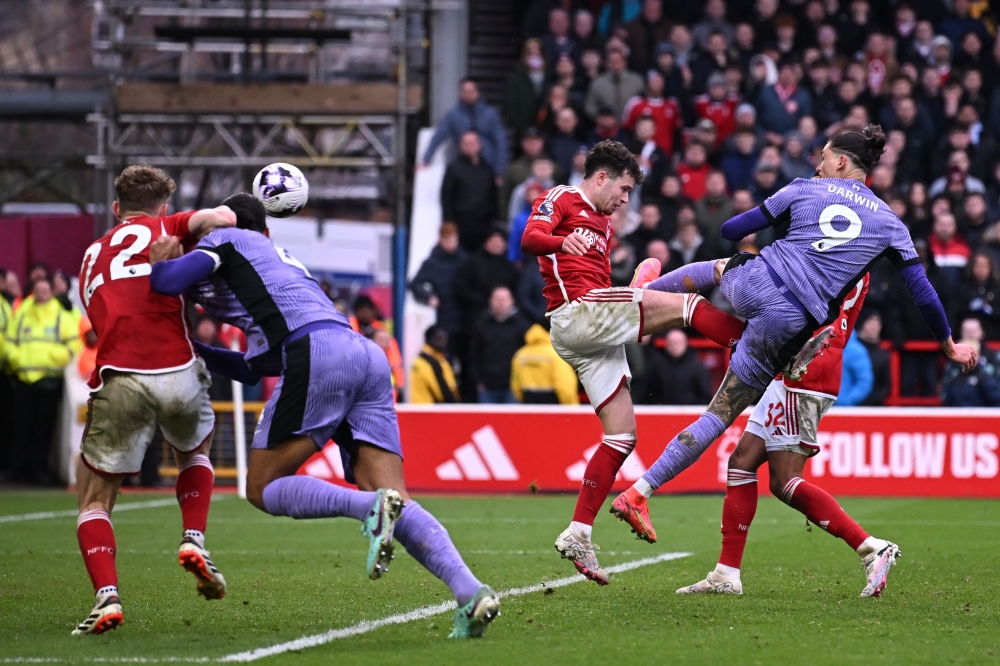 Liverpool's Uruguayan striker #09 Darwin Nunez scores a goal during the English Premier League football match between Nottingham Forest and Liverpool at The City Ground in Nottingham, central England, on March 2, 2024. (Photo by Paul ELLIS / AFP) 