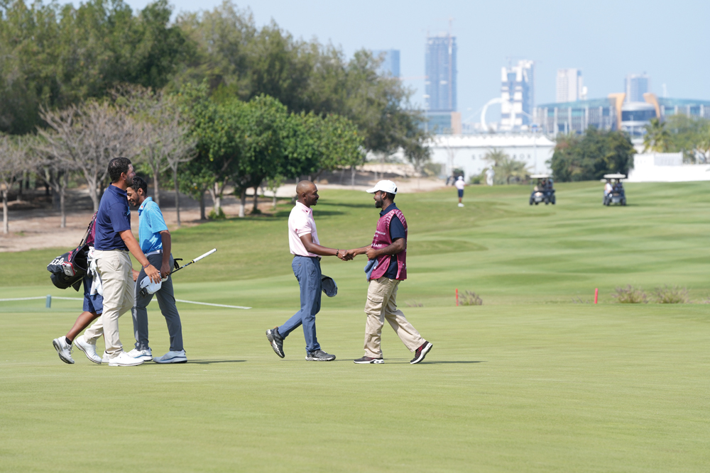 Saleh Al Kaabi celebrates after completing his round.
