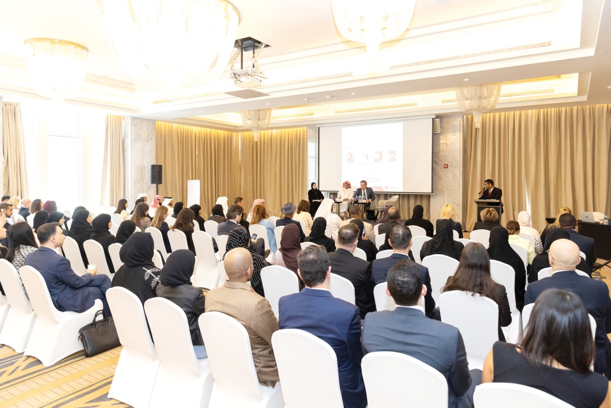 Panelists speaking during the event hosted by QICDRC.