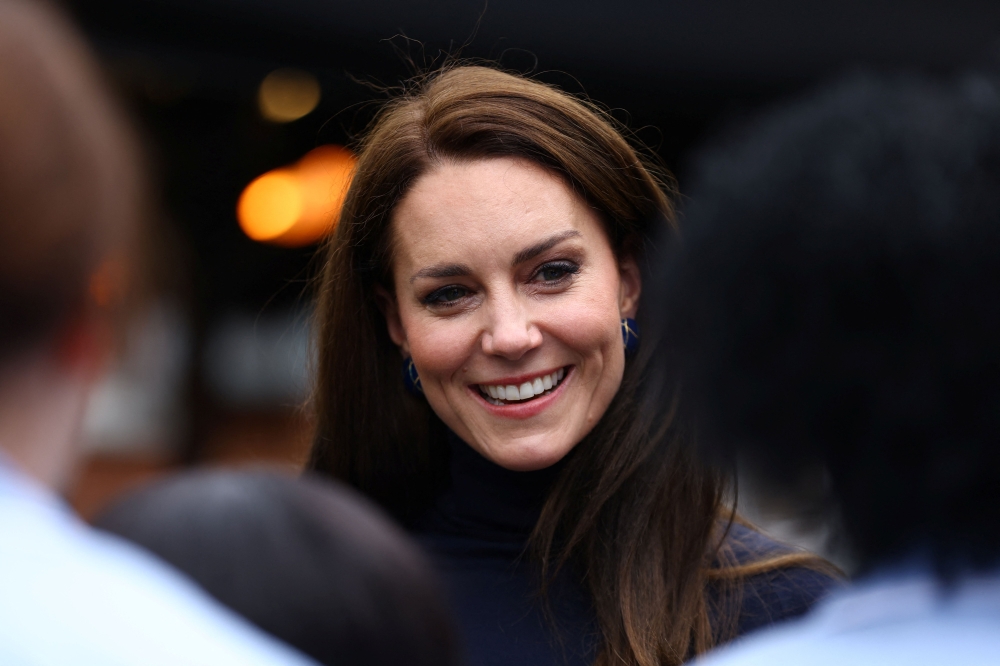 Britain's Catherine, Princess of Wales meets with residents and members of staff during a visit of the Oxford House Nursing Home in Slough, on February 21, 2023. Photo by HANNAH MCKAY / POOL / AFP