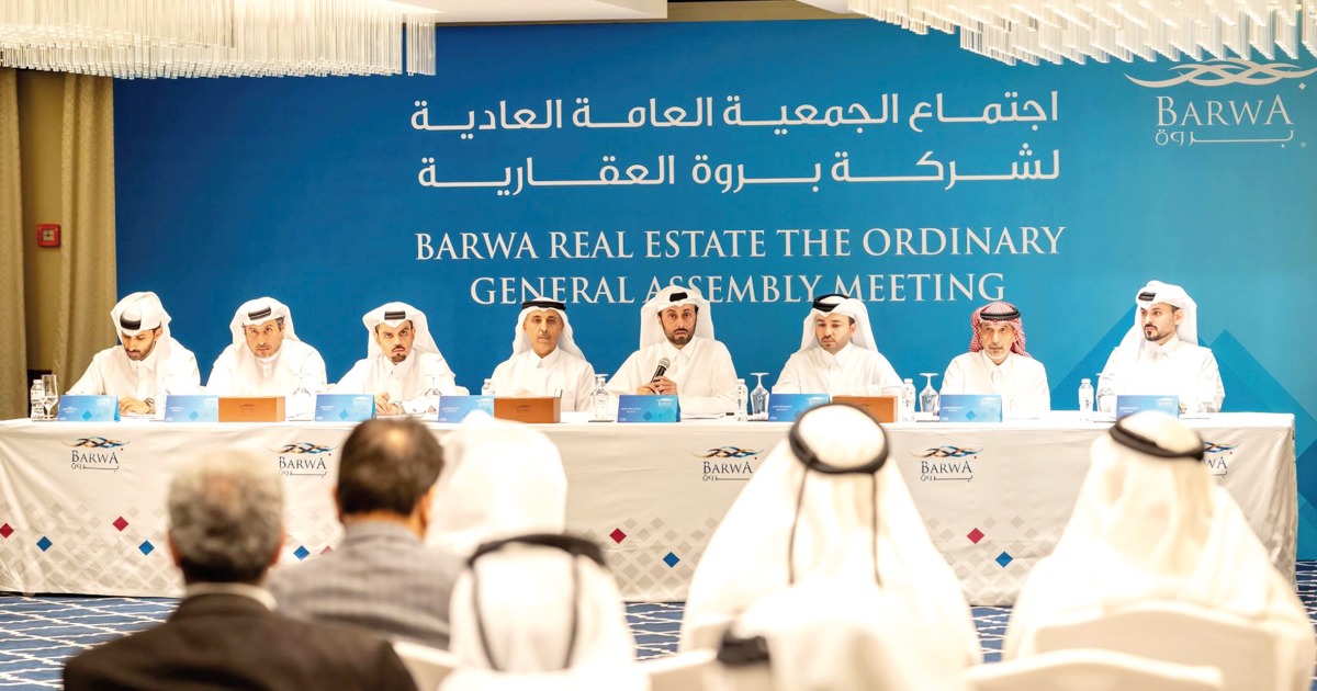 Chairman of the Board of Directors of Barwa Real Estate H E Abdullah bin Hamad bin Abdullah Al Attiya with other officials at the meeting, yesterday.