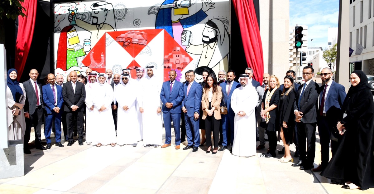HSBC Qatar CEO Abdul Hakeem Mostafawi, Qatari artist Mubarak Al Malik with other officials marking 70th anniversary of HSBC, yesterday.