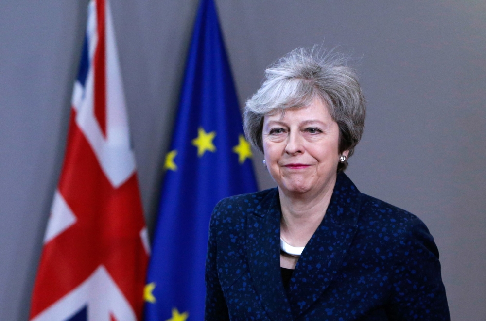 British Prime Minister Theresa May leaves after a meeting with the President of the European Council at the European Council in Brussels on February 7, 2019 Photo by Aris Oikonomou / AFP