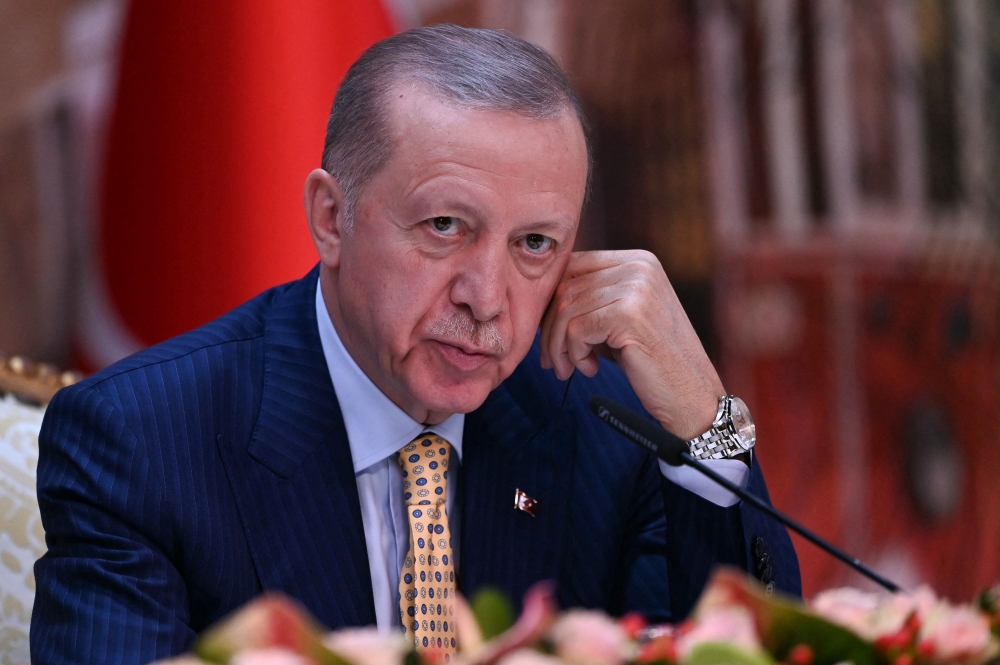 Turkish President Recep Tayyip Erdogan attends a joint press conference with Ukrainian President at the Dolmabahce Presidental office in Istanbul on March 8, 2024. (Photo by OZAN KOSE / AFP)
