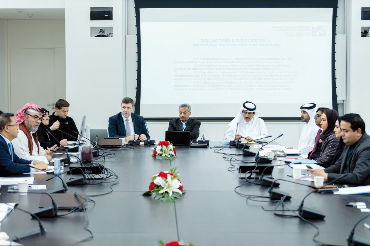 Participants and officials during the roundtable discussion.