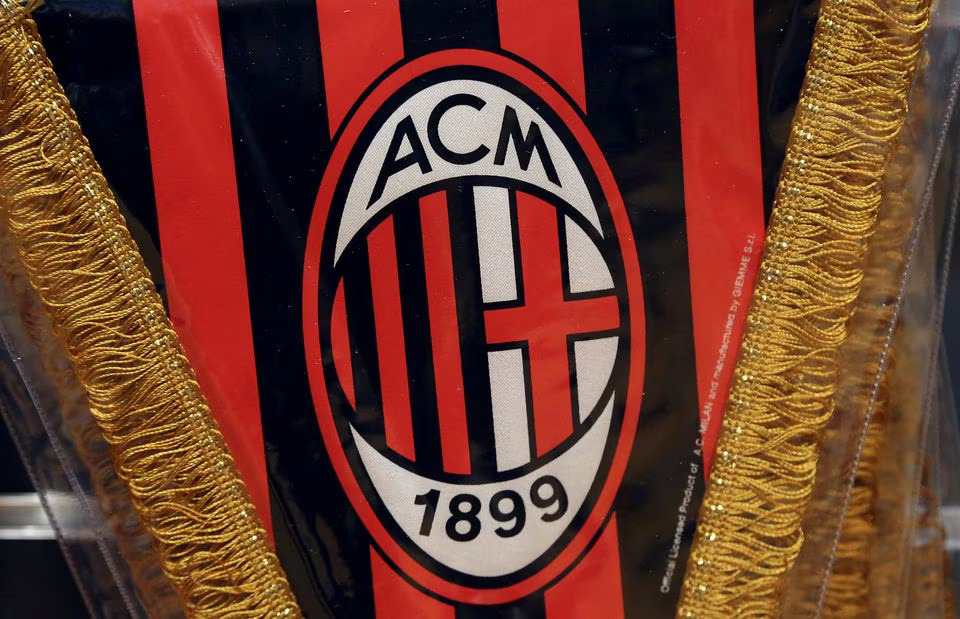 File photo: The AC Milan logo is pictured on a pennant in a soccer store in downtown Milan, Italy April 29, 2015. File Photo: REUTERS/Stefano Rellandini

