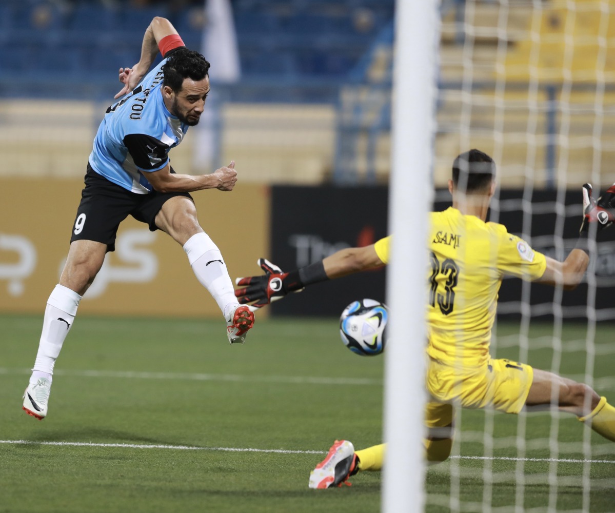 Mohamed Benyettou scores Al Wakrah's first goal against Umm Salal from the penalty spot.