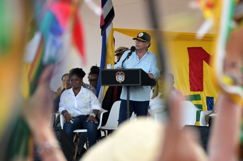 Colombian President Gustavo Petro speaks, next to Vice President Francia Marquez during a traditional 