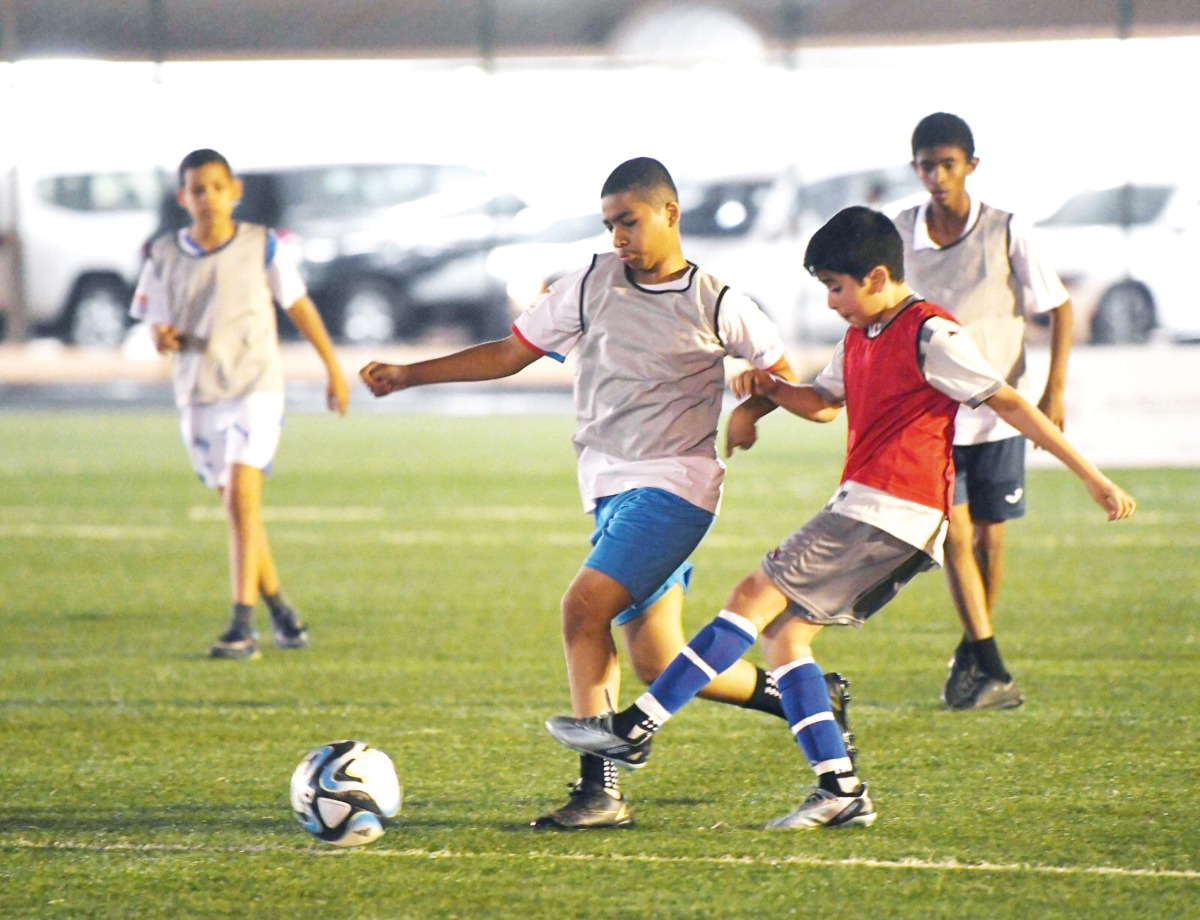 Action during the Al Thumama Ramadan Football Tournament.