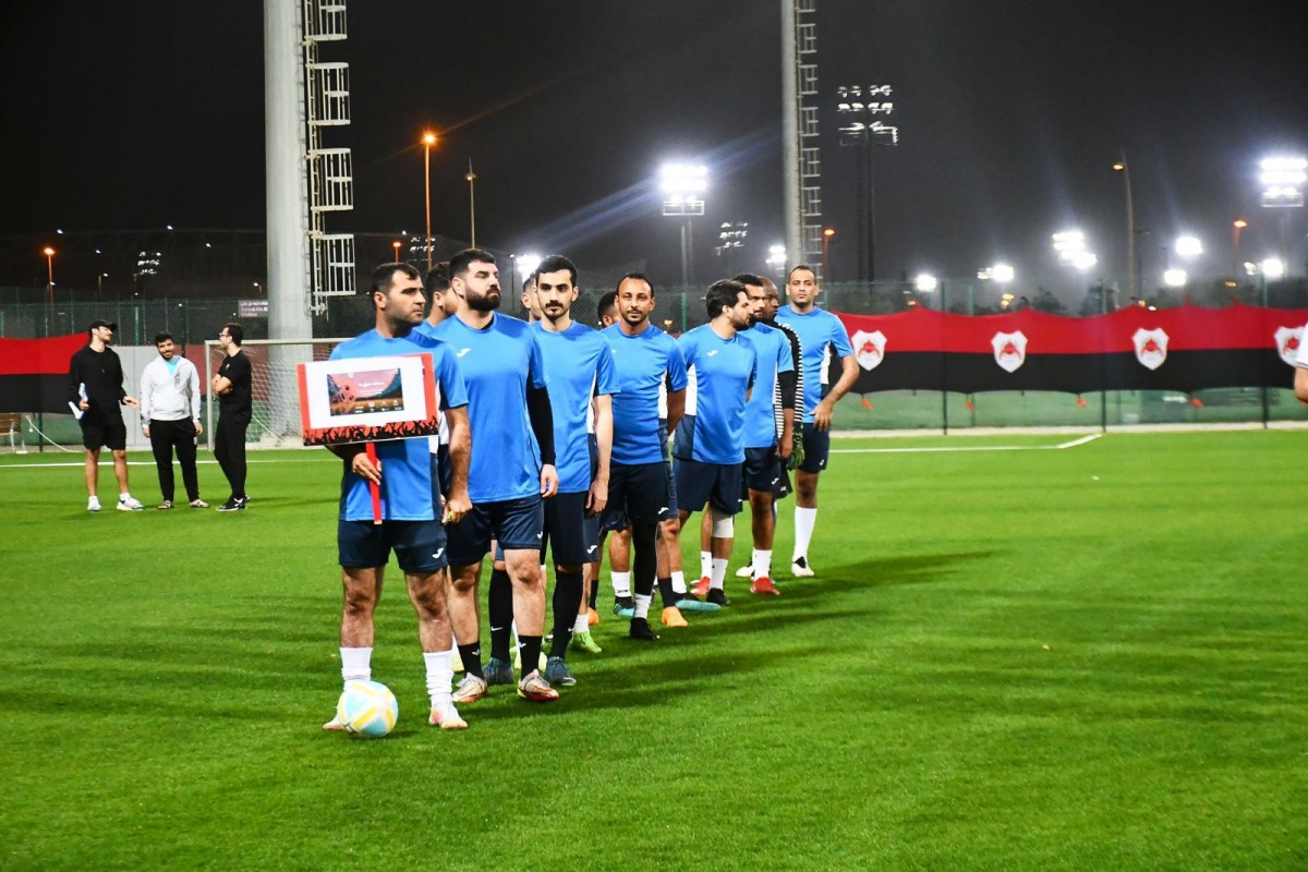 Players attend the opening ceremony of the 26th Al Rayyan Ramadan Football Championship.