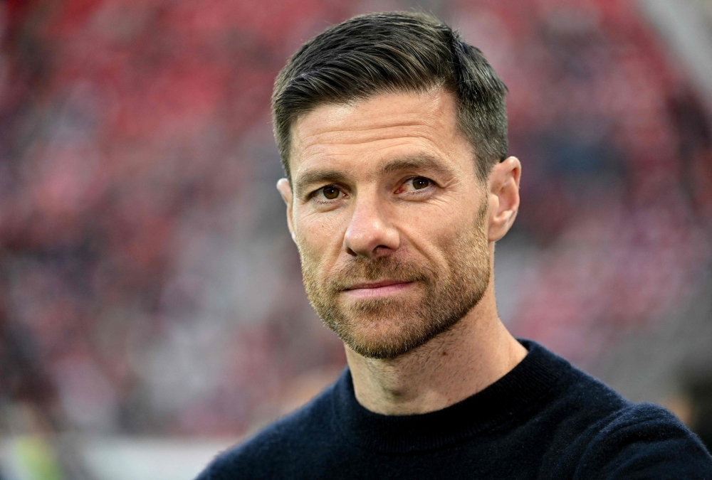 File photo: Bayer Leverkusen's Spanish coach Xabi Alonso looks on ahead the UEFA Europa League Group semi final second leg football match between Bayer Leverkusen and AS Roma in Leverkusen, on May 18, 2023. Photo by INA FASSBENDER / AFP

