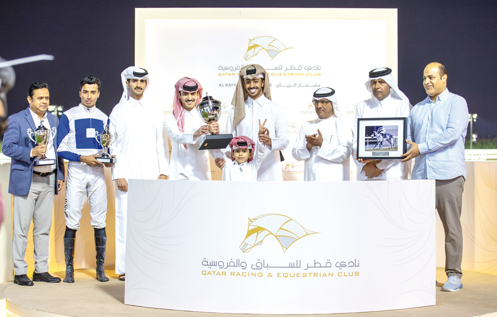 The connections of Tajamhor celebrate after  the Al Dibal Cup triumph. PICS: Juhaim/QREC