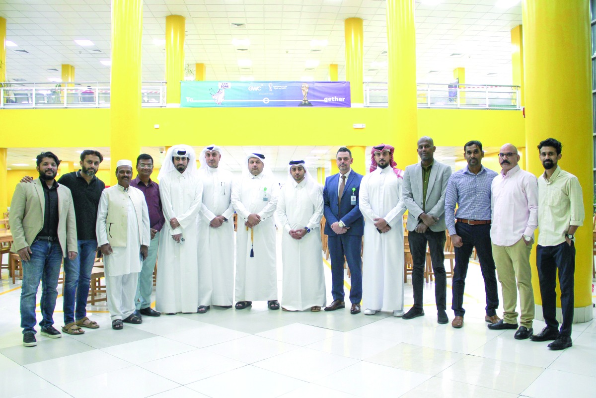 GWC officials pose with employees as part of its CSR program during Ramadan.