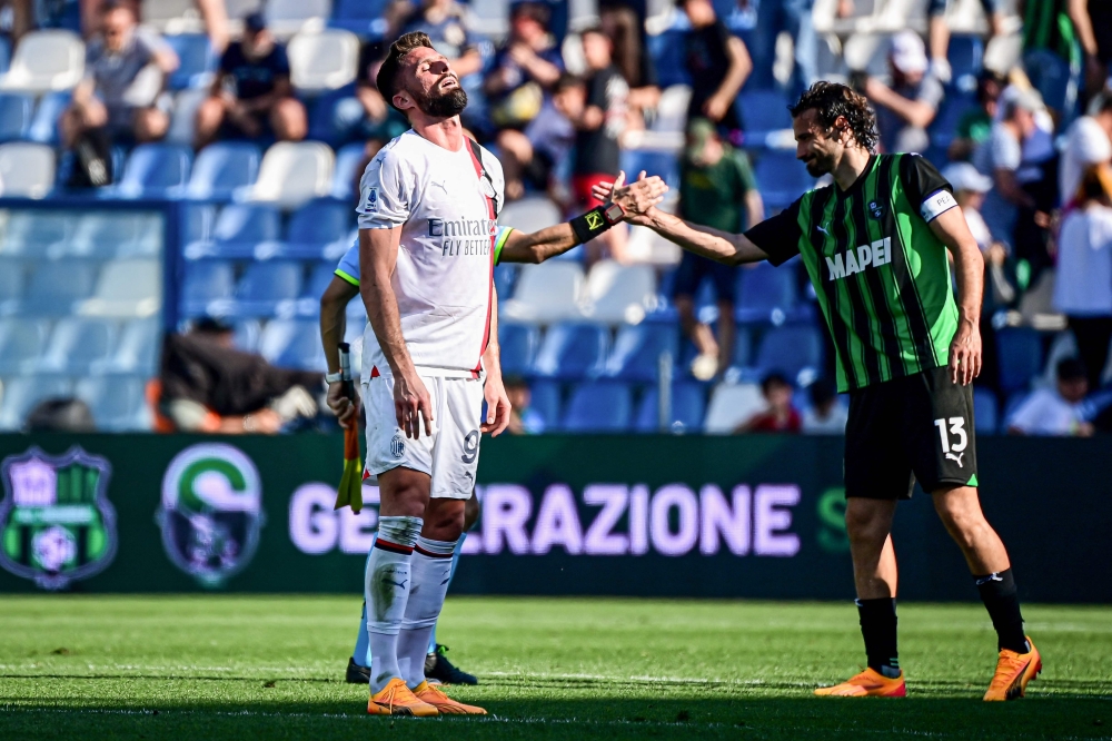 AC Milan's French forward #09 Olivier Giroud reacts at the end of the Italian Serie A football match between Unione Sportiva Sassuolo and AC Milan at the Mapei Stadium in Reggio Emilia, on April 14, 2024. (Photo by Piero CRUCIATTI / AFP)
