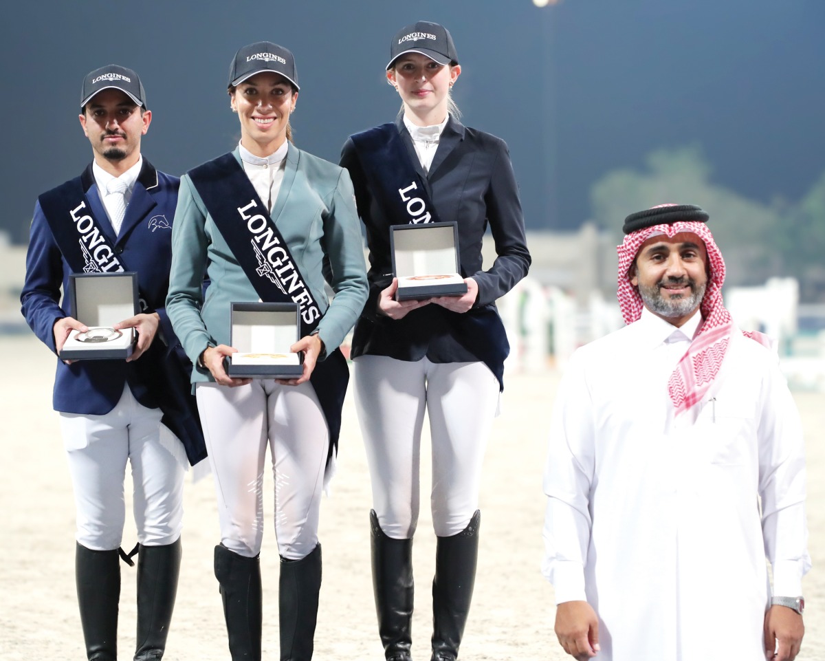 Longines Hathab Deputy Director Faisal Al Kahla poses with the podium winners of Big Tour. 