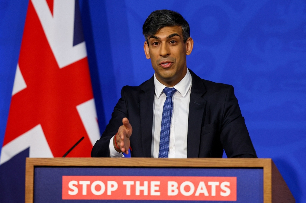 Britain's Prime Minister Rishi Sunak speaks during a press conference, at the Downing Street Briefing Room, in central London, on April 22, 2024 regarding the Britain and Rwanda treaty. (Photo by Toby Melville / Pool / AFP)