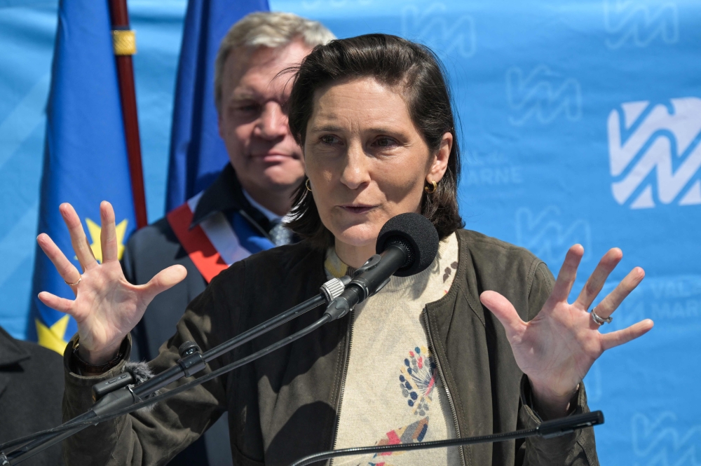 France's Minister for Sports and Olympics Amelie Oudea-Castera gestures as she delivers a speech during the inauguration ceremony of the Departmental River Water Treatment Station in Champigny-sur-Marne near Paris, on April 23, 2024. Photo by Bertrand GUAY / AFP