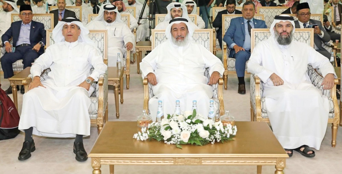 Minister of Awqaf and Islamic Affairs H E Ghanem bin Shaheen Al Ghanem (centre), Undersecretary of the Ministry of Education and Higher Education (MoEHE) Dr. Ibrahim bin Saleh Al Nuaimi (left) and Director of General Directorate of Endowments Dr Sheikh Khalid bin Mohammed bin Ghanem Al Thani during honuring ceremony.