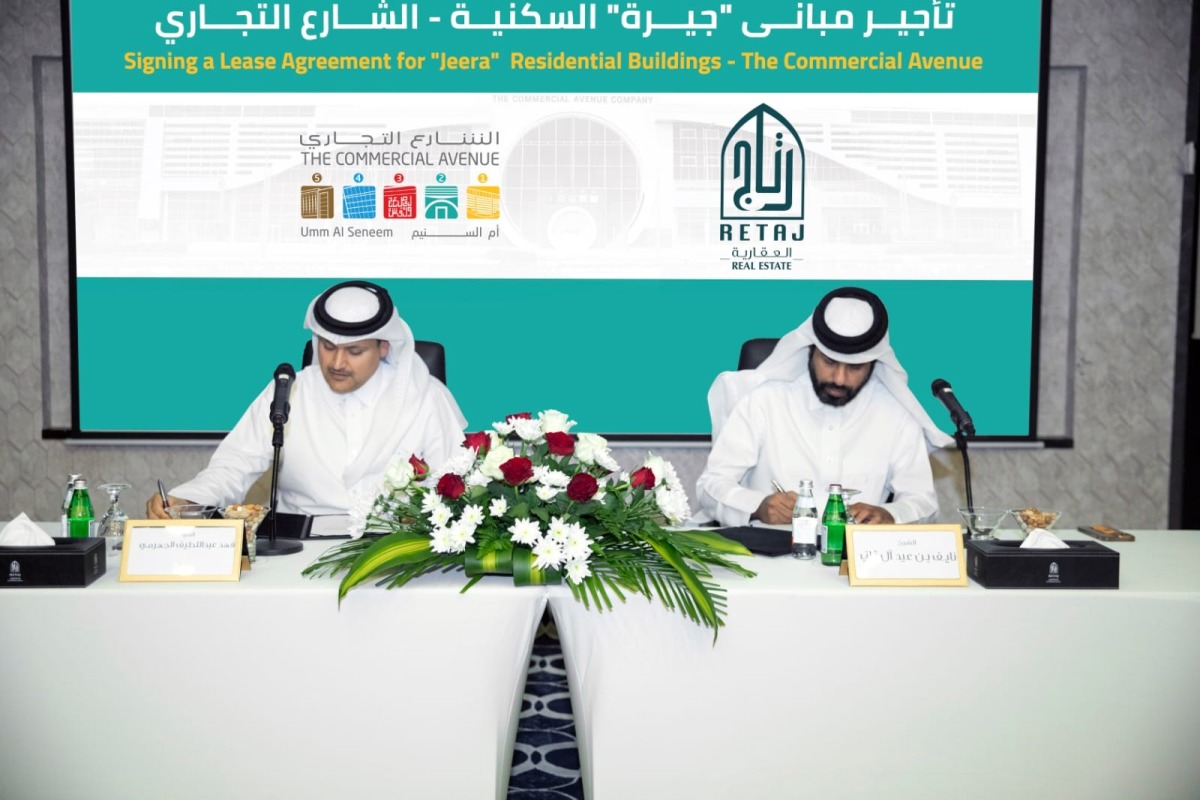 Officials signing a long-term agreement on 'Jeera' residential buildings.