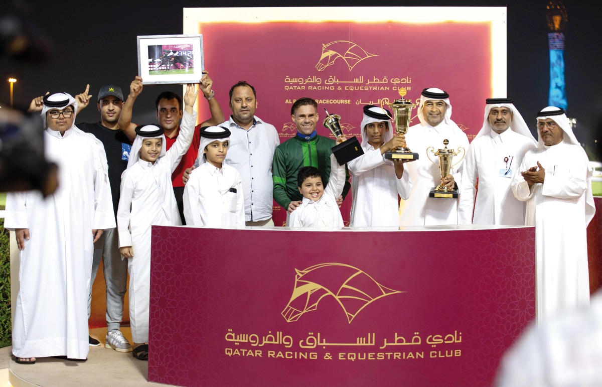 The connections of General Panic celebrate after the win. Al Uqda Complex Manager Abdulaziz Jassim Al Boenain and QREC Racing Manager Abdulla Rashid Al Kubaisi are also present. PIC: Juhaim/QREC 