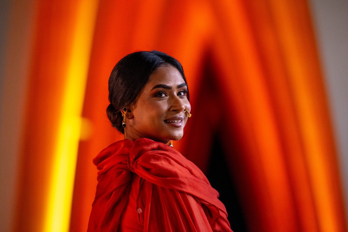 Handout picture released by El Gouna Film Festival, Sudanese actress Eiman Yousif arrives to the screening of movie 'Goodbye Julia' on December 16, 2023. (Photo by Ammar Abd Rabbo / El Gouna Film Festival / AFP) 