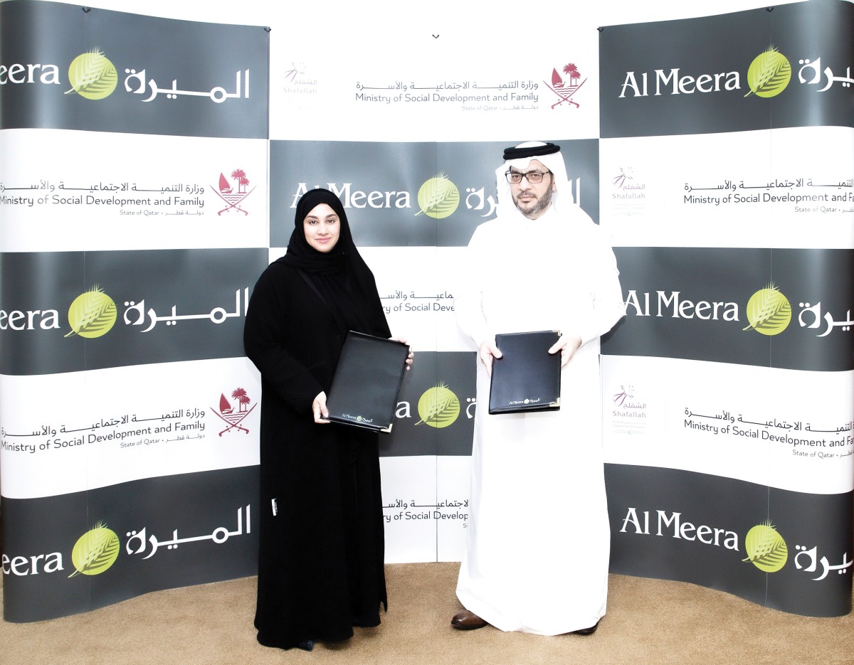 Al Meera and Shafallah Center officials at the MoU signing ceremony.