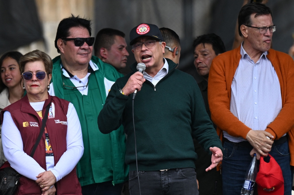 Colombian President Gustavo Pestro delivers a speech during a May Day (Labor Day) rally in Bogota on May 1, 2024. (Photo by Raul ARBOLEDA / AFP)
