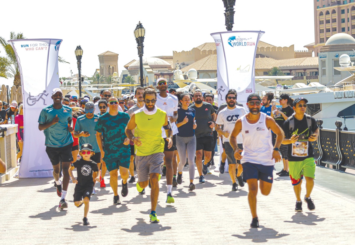 Qatar stars Mutaz Barshim, Almoez Ali and Abdulla Al Tamimi compete alongside others during an earlier edition of the Wings for Life World Run.