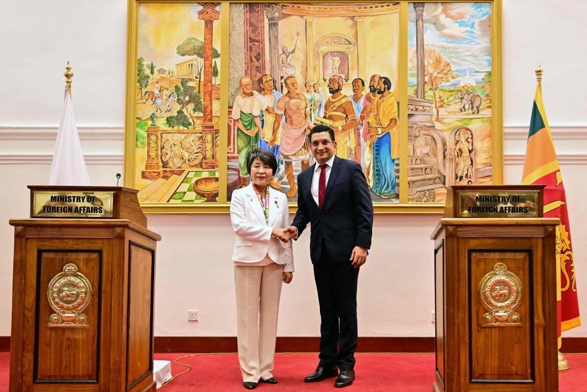 Sri Lanka's Foreign Minister Ali Sabry (R) shakes hands with Japan's foreign Minister Yoko Kamikawa after a joint press conference in Colombo on May 4, 2024. (Photo by Ishara S.KODIKARA / AFP)

