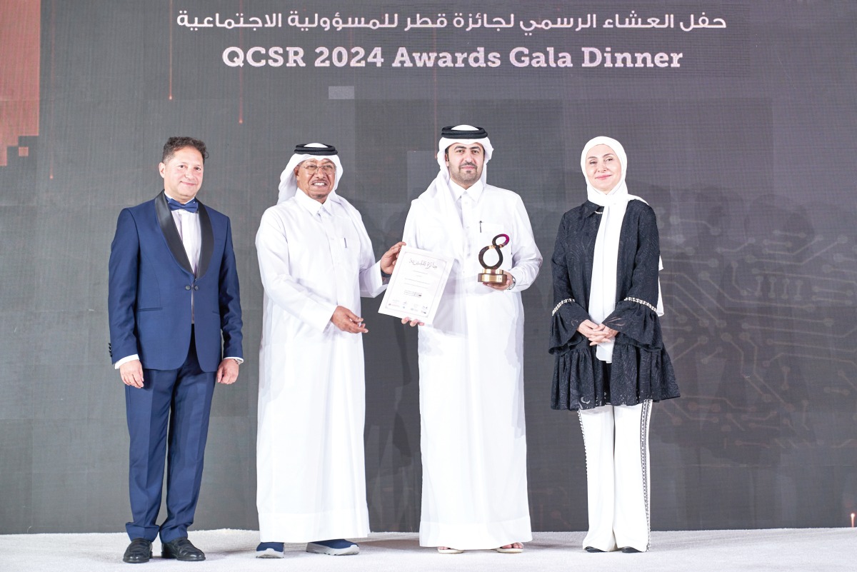 Ooredoo officials along with others during the CSR Awards ceremony. 