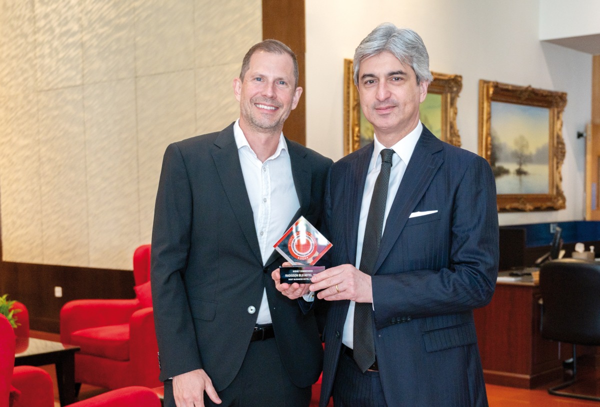 Radisson Blu Doha officials with the award at the 2024 Business Traveller Middle East Awards.